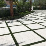 Driveway with artificial grass design